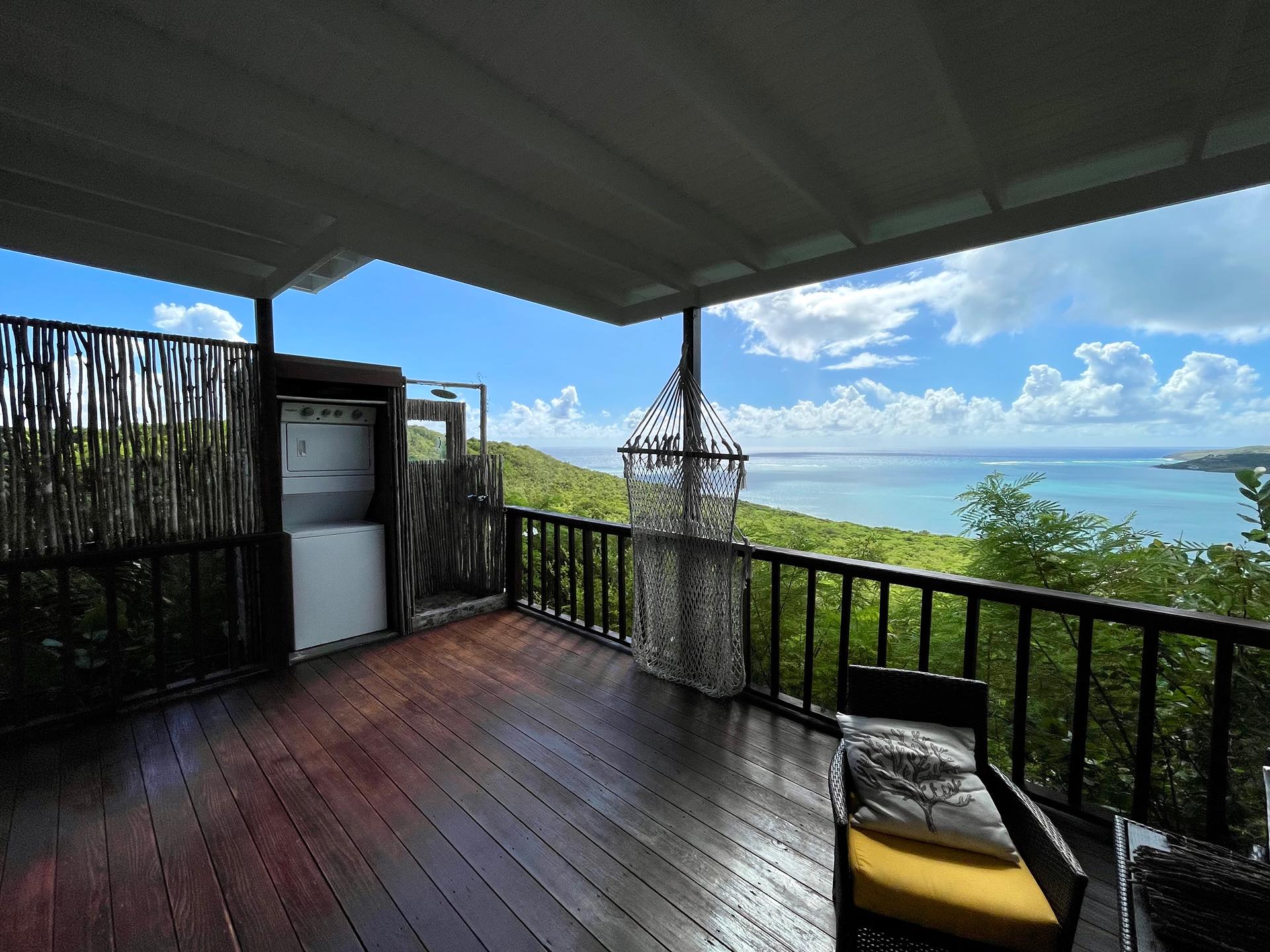 The expansive porch—washer/dryer and outdoor shower included!